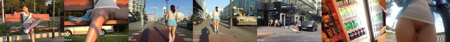 Dziewczyna z ogoloną cipą jeździ po mieście hulajnogą, w samej koszulce, bez majtek